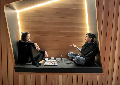 two residents sitting insite the abstract loft inside Prospect Street