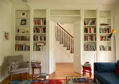 photo of library shelves and stairway